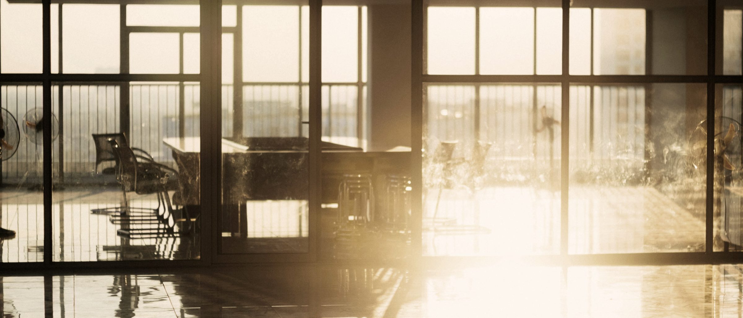 Early morning light across an empty office